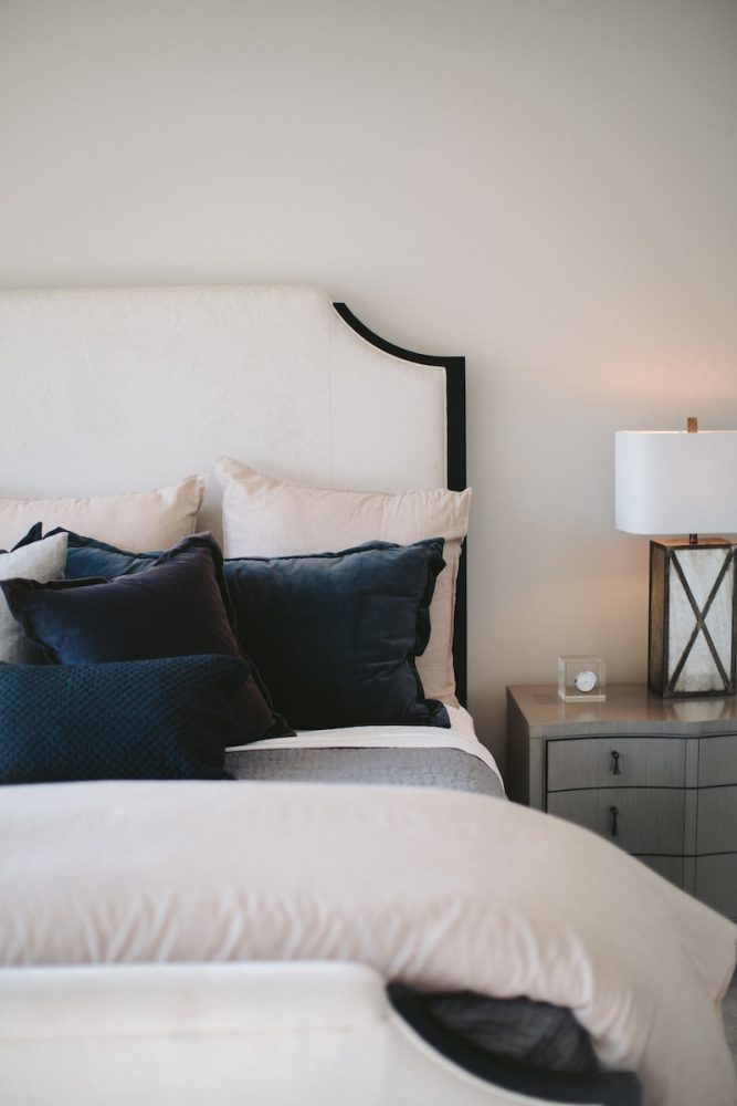 black and white bed pillows on bed