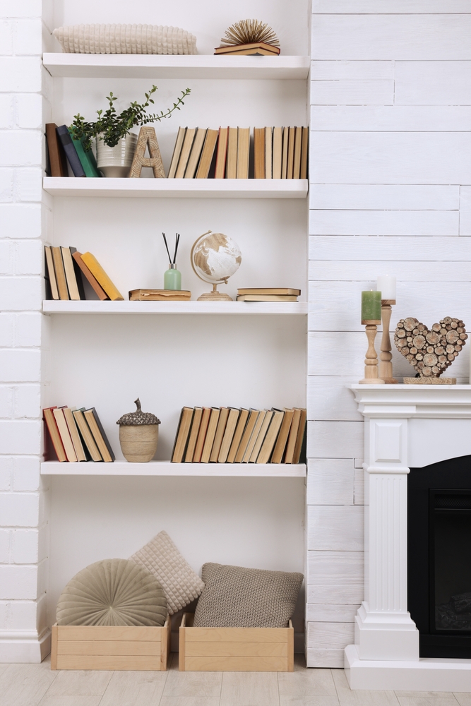 Collection,Of,Books,And,Decor,Elements,On,Shelves,Indoors.,Interior