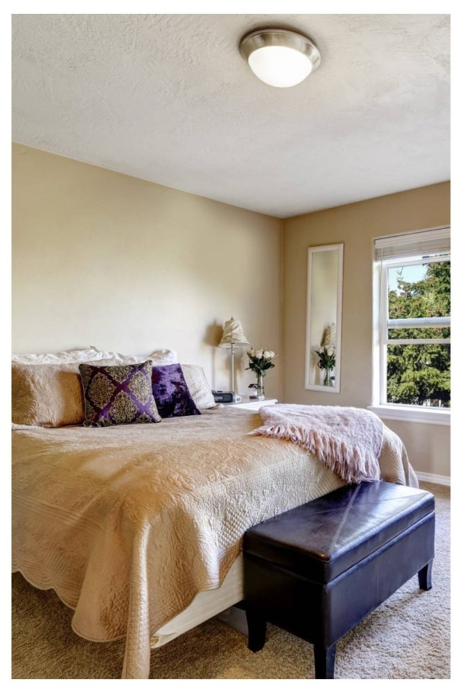 storage bench at the foot of the bed Clever Small Bedroom Organization Ideas