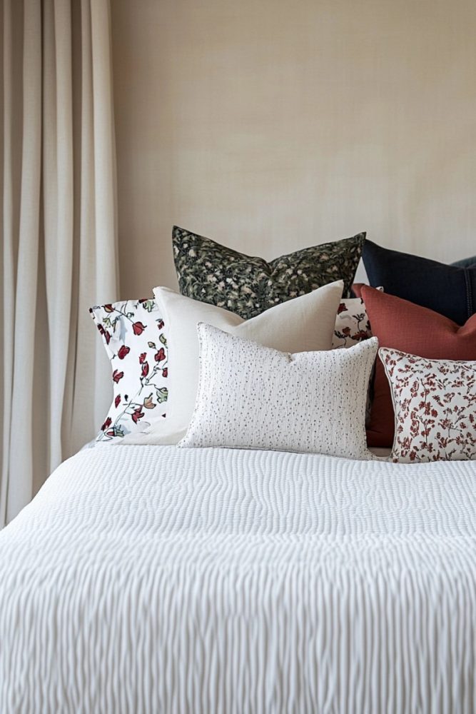 How to arrange bedroom pillows without headboard Bold Pattern Mix