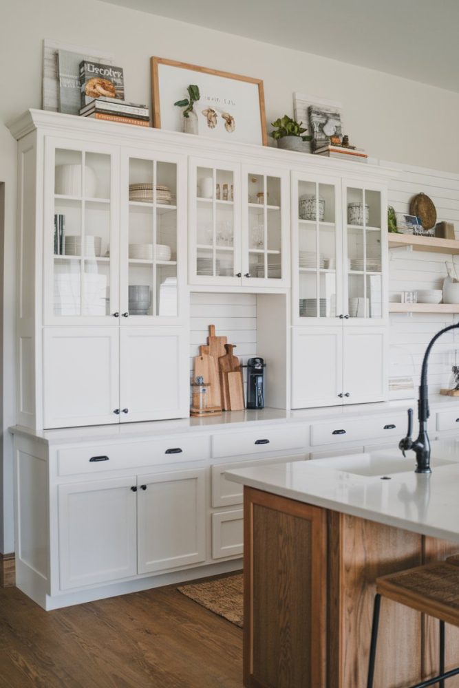 above kitchen cabinet decor books