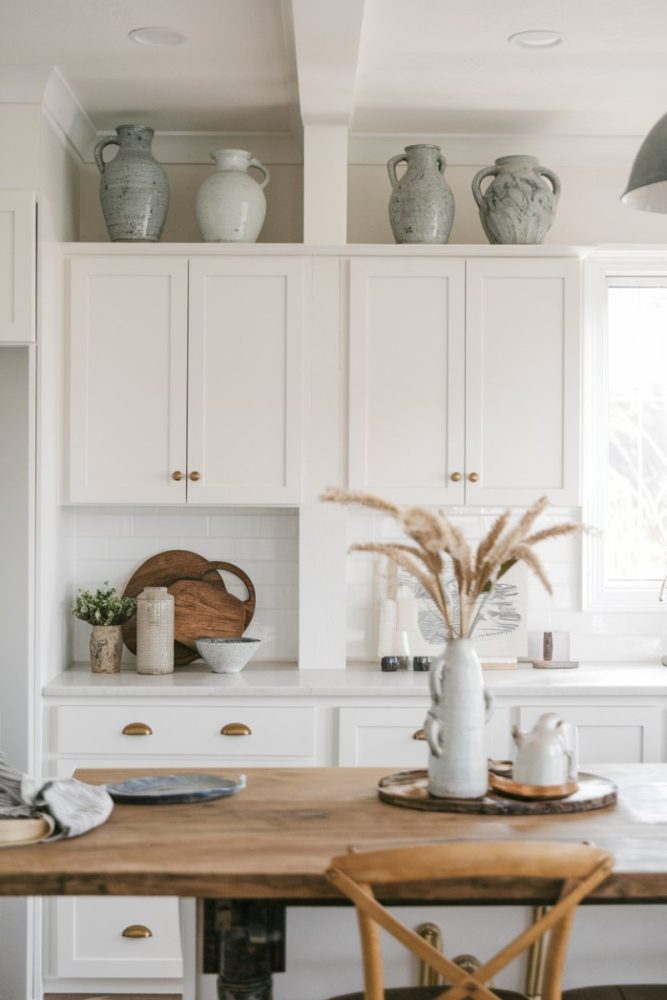 above kitchen cabinet decor vases