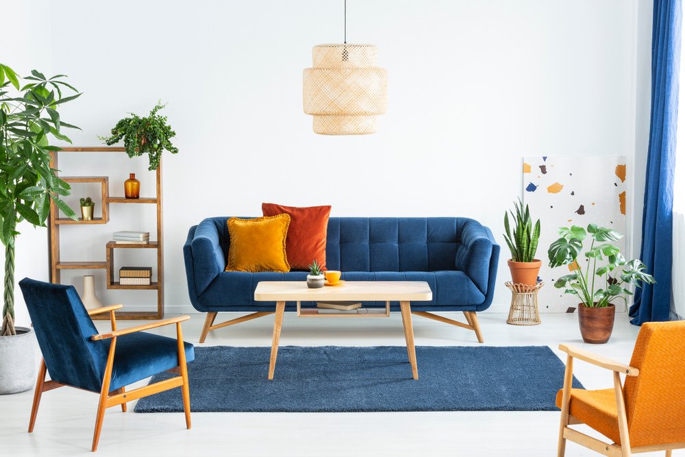 Retro,Armchairs,With,Wooden,Frame,And,Colorful,Pillows,On,A
