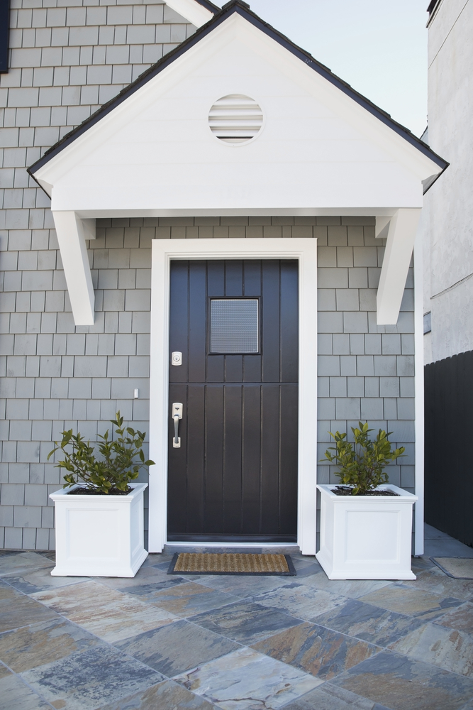 Front,Door,Of,An,Upscale,Home/vertical,Shot,Of,A,Black