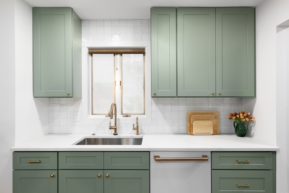A,Kitchen,Detail,With,Sage,Green,Cabinets,,White,Marble,Countertop,