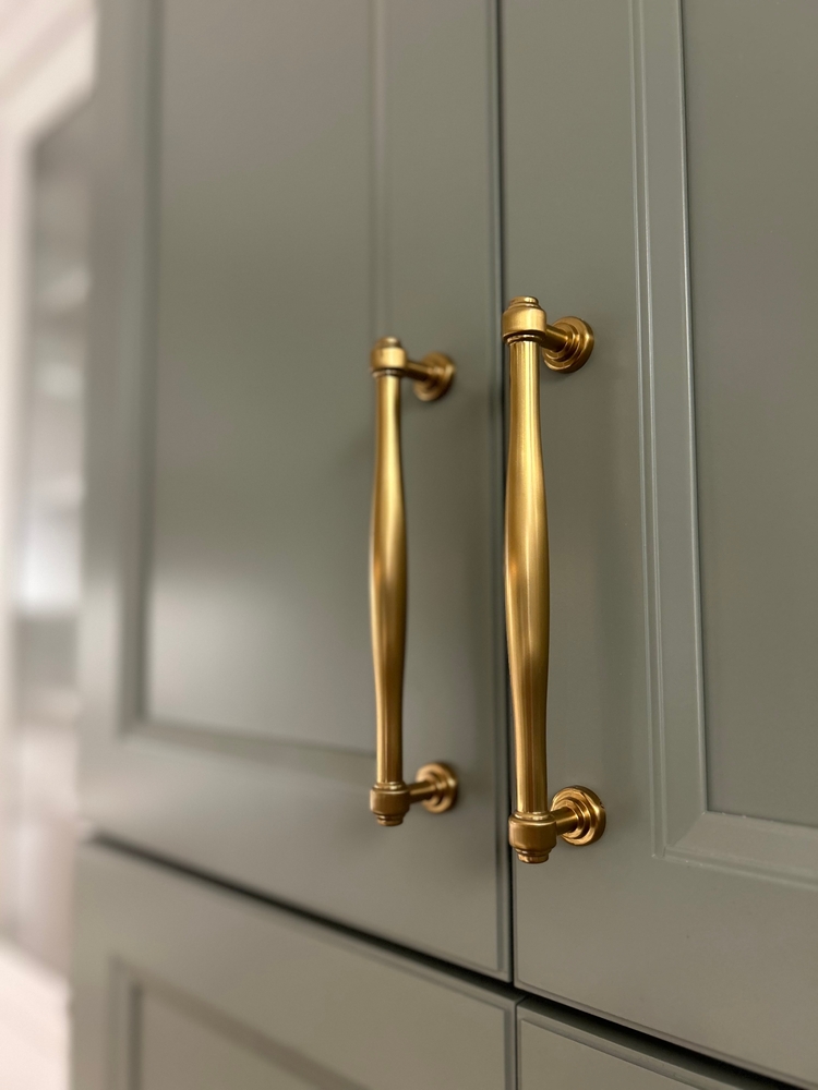 Brass,Cabinet,Hardware,On,Green,Cabinets