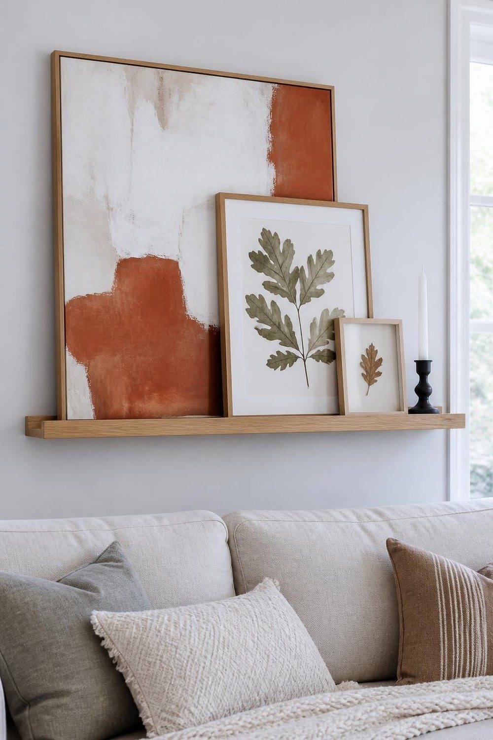Light oak picture ledge with layered leaning fall abstract and oak leaf botanical art