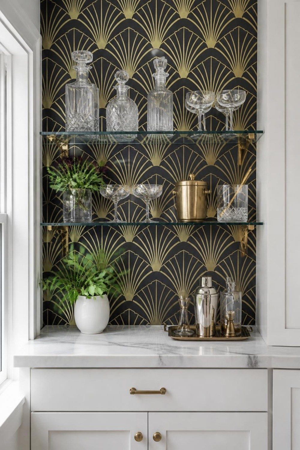 Home bar shelves with black and gold art deco wallpaper and crystal decanters